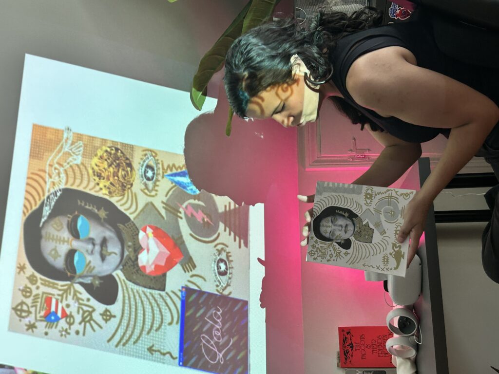 Shey Rivera showing some of their in-process works. Featured here is a tribute to Puerto Rican liberator Lolita Lebron.