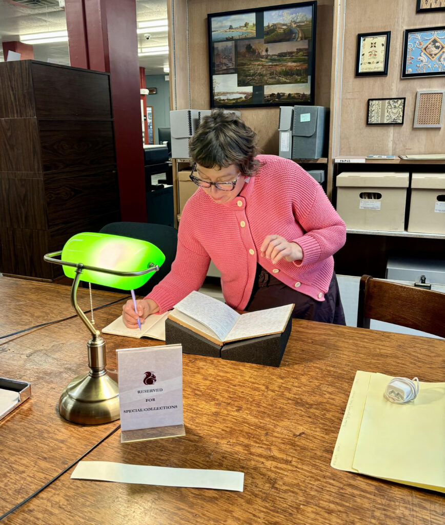 Traci Picard captured during her research at the Rhode Island Historical Society, by Dana Signe Munroe